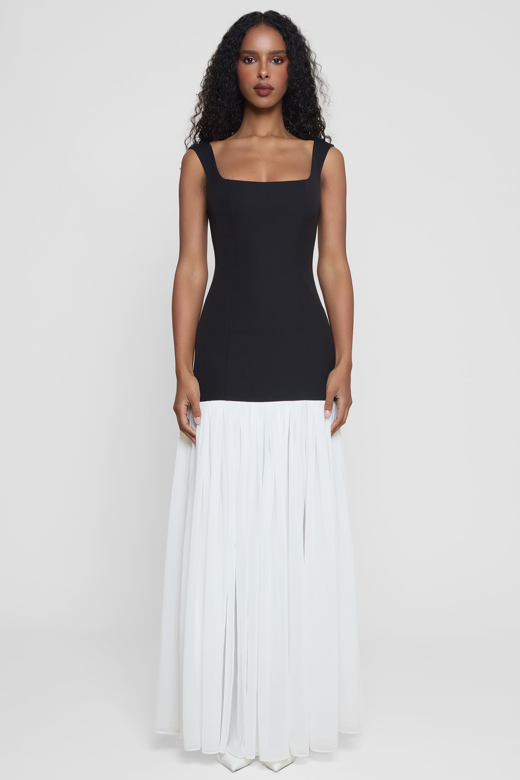 Model wearing Phantom Contrast Chiffon Maxi Dress in Black/White, front view.