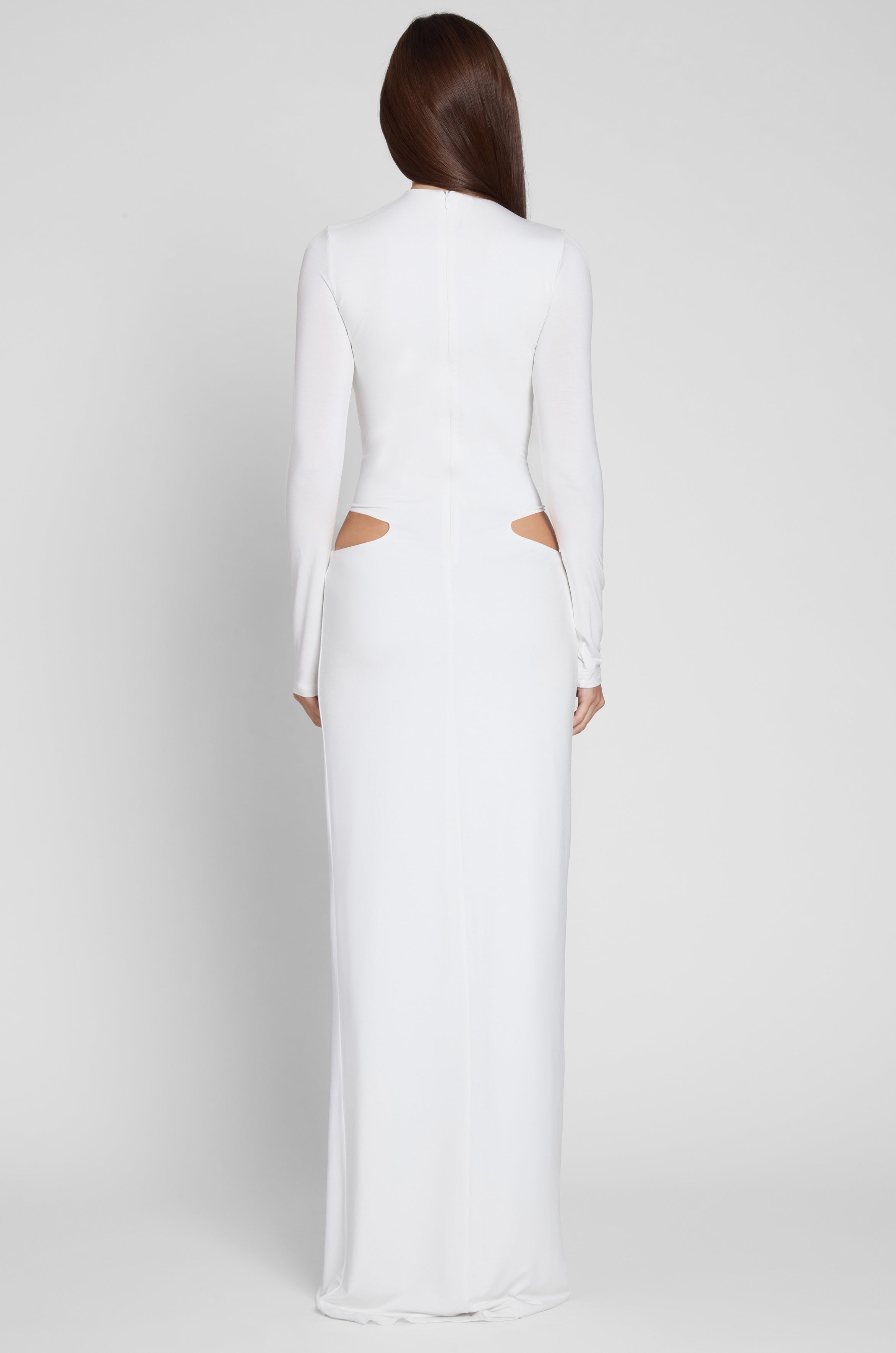 Model wearing Vacanza Drape Gown in White, back view.